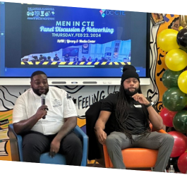 Men in CTE - two Black men with microphones talk to students about their careers 