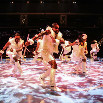 Dancers dressed in all white 