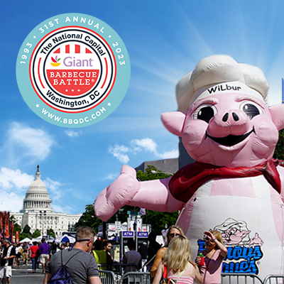 BBQ Festivals inflated pig with chefs hat on with the Capitol building in the background 