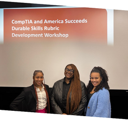 three individuals smiling at camera in front of america succeeds powerpoint 